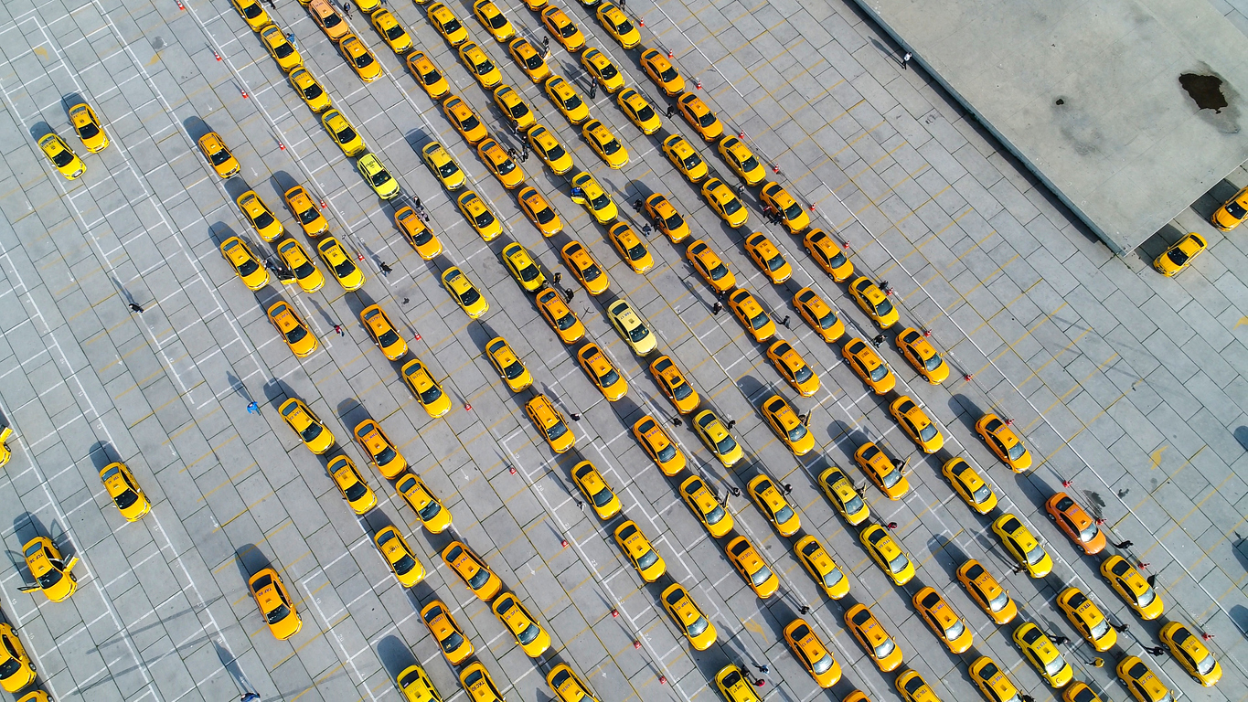 Photo of yellow taxi cabs representing multiple virtual desktops setup through Amazon Workspaces Pools